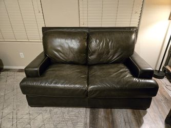 Living Spaces Leather Love Seat