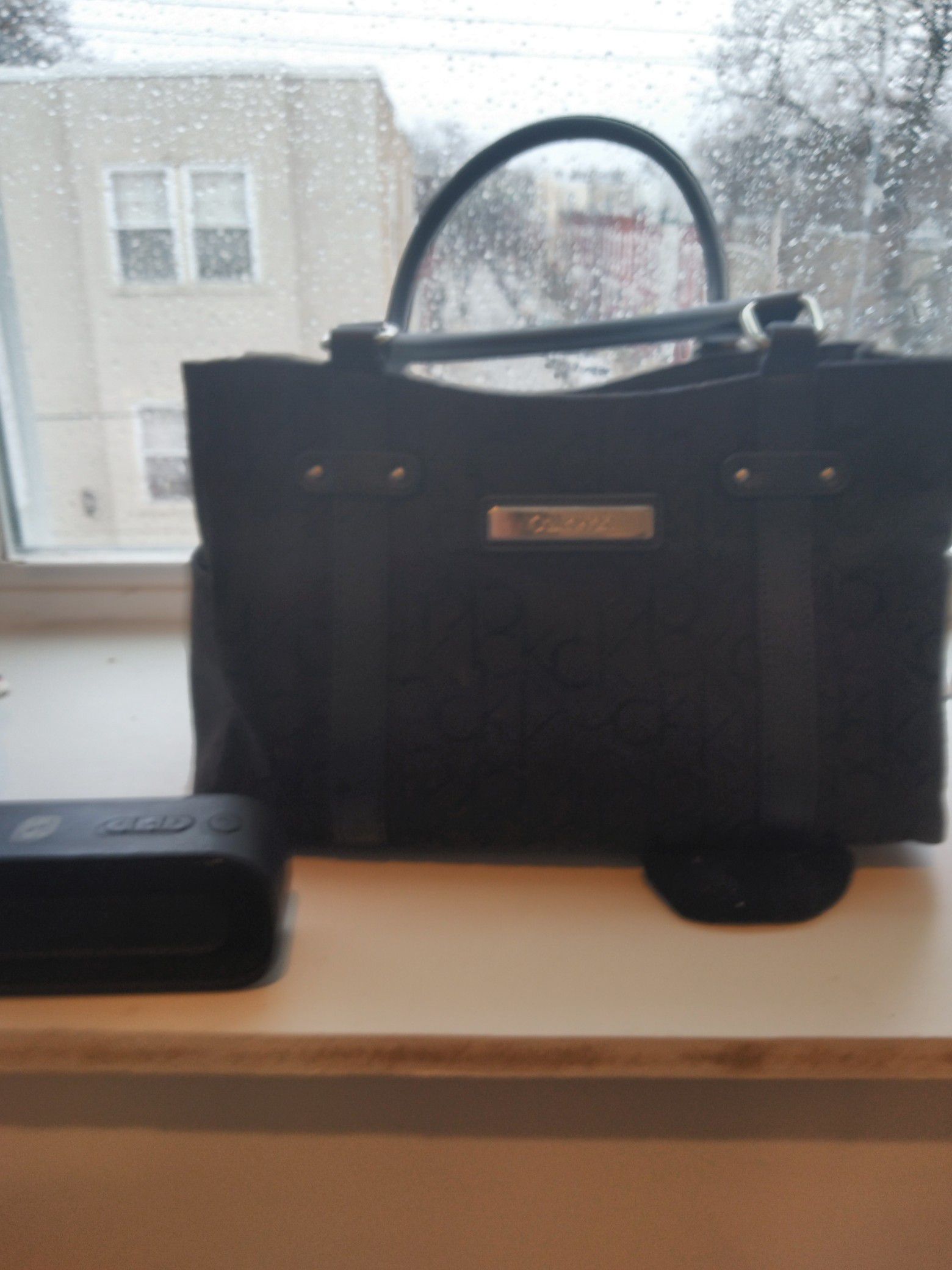 Calvin Klein, black shoulder purse.