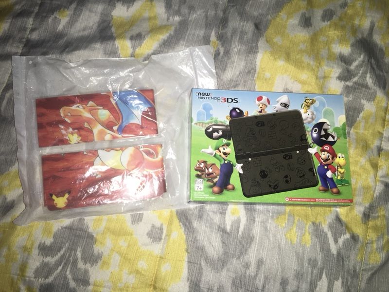 Limited edition New Nintendo 3DS Mario Black with Charizard Faceplate