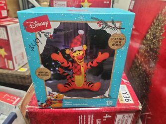 Disney
3 ft. Tall x 2.7 ft. W Christmas Inflatable Airblown-Tigger with Christmas Plaid Santa Hat and Scarf