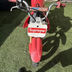 Honda 50cc Color Red And Grey It’s Small But Fast.