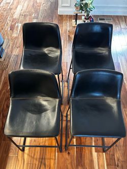 Black leather bar stools