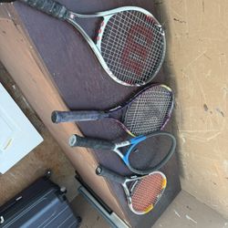 Eight Tennis Rackets