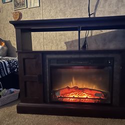 Entertainment center and fireplace heater