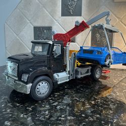 Driven Tow Truck and Sport car