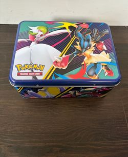 Pokémon New Tin W Stickers & Mini Binder $5