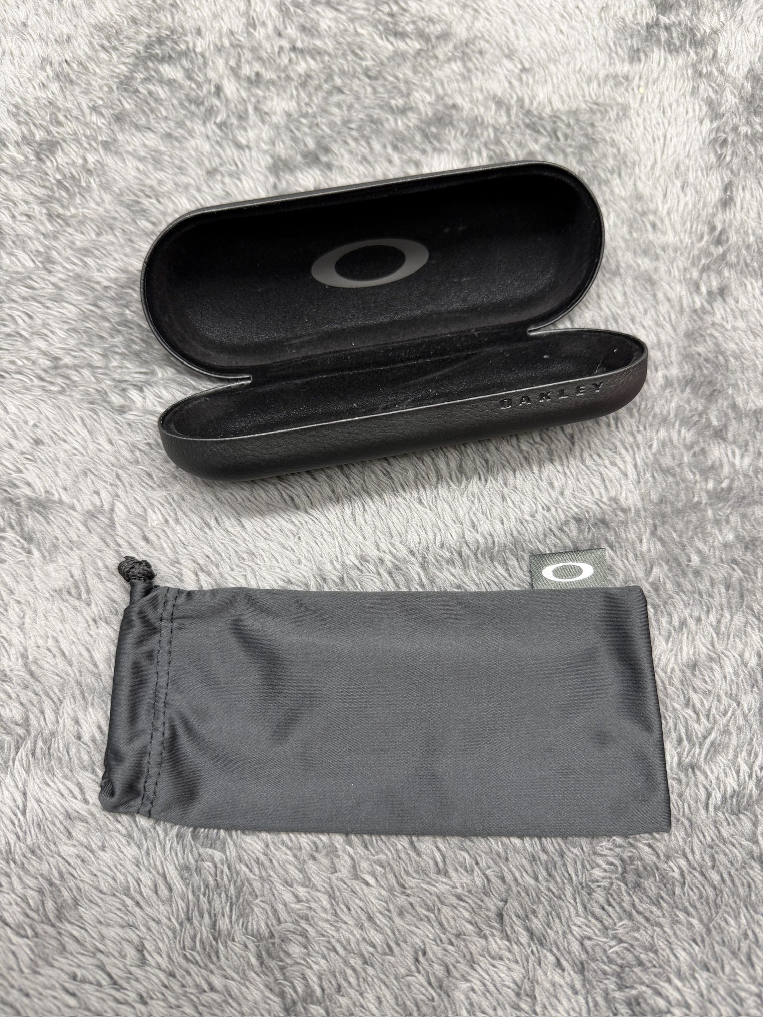 Bundle of Black Oakley Hard and Soft Cases. Total price for the pair.  