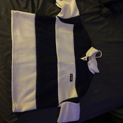 White and navy blue long sleeve polo