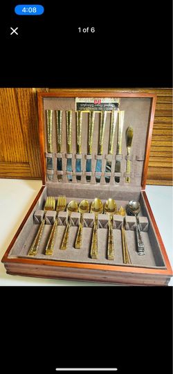 Set of 37 gold-plated flatware by 1847 Rogers & Bros. Wood storage case. Also 8 stainless forks