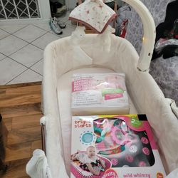 Bassinet with new sheet n new baby gym