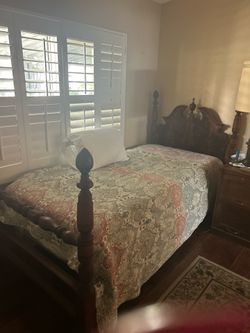 Twin ornate 4 poster bed.