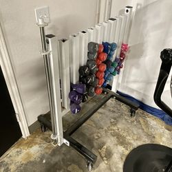 Weight Rack And Dumbbells  