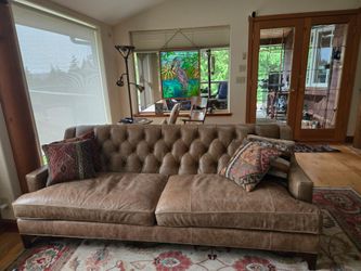 New leather mid-century modern Chesterfield coach