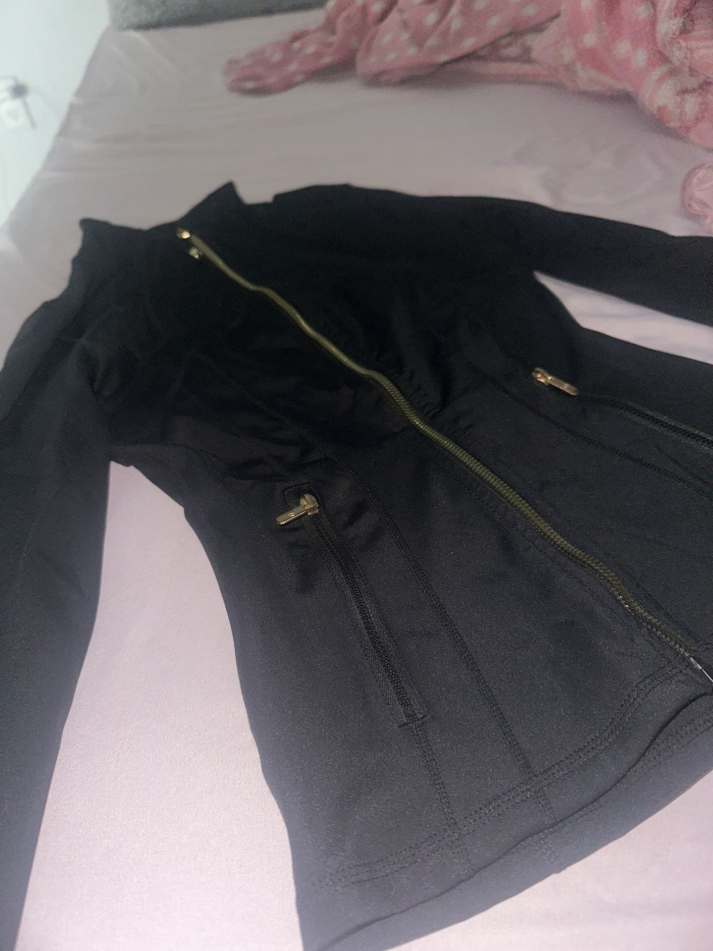 60$ Lululemon sweater black and gold zipper