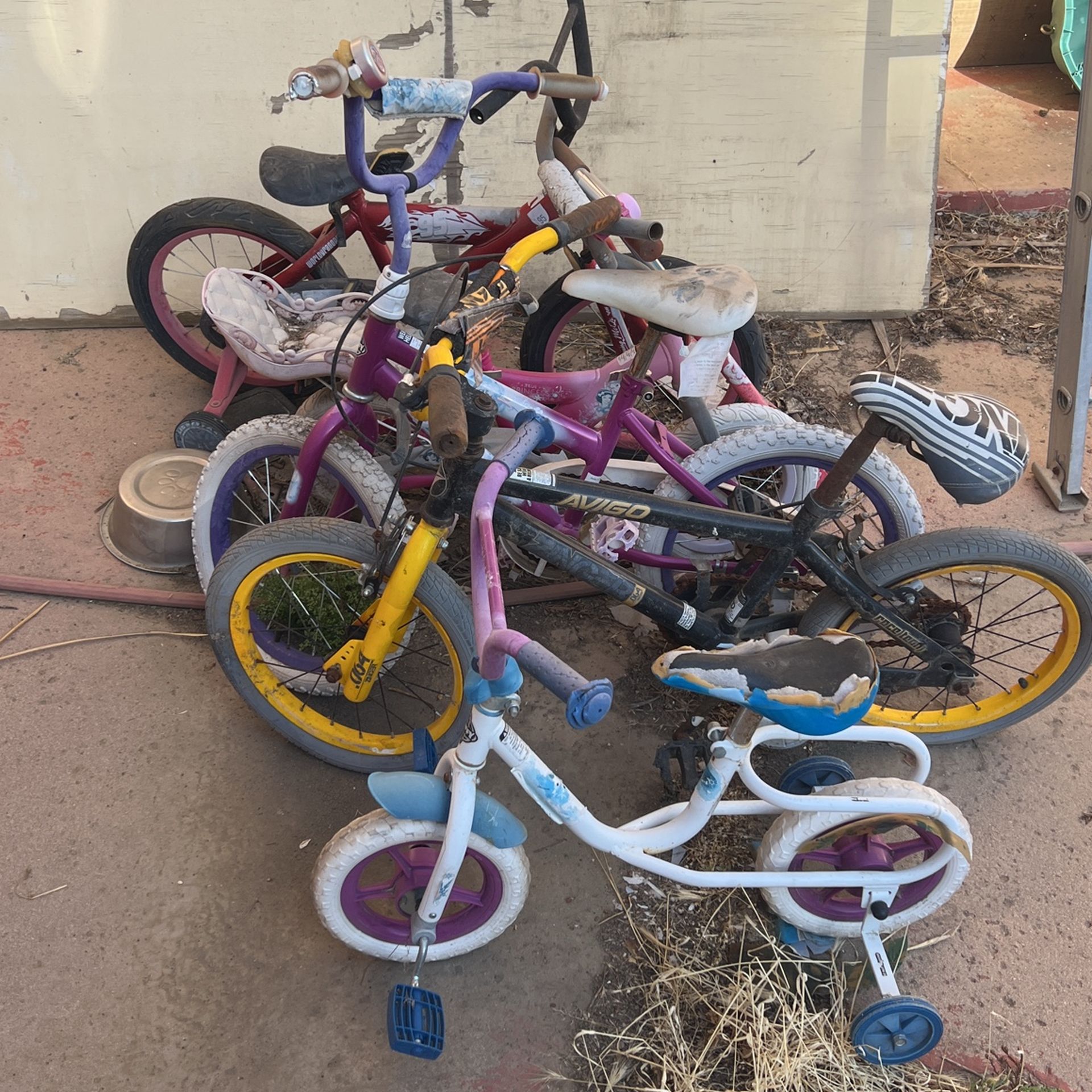 5 Kids Bikes And A Scooter