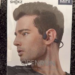 Sealed New Shokz OpenRun Mini bone conduction sport headphones.  