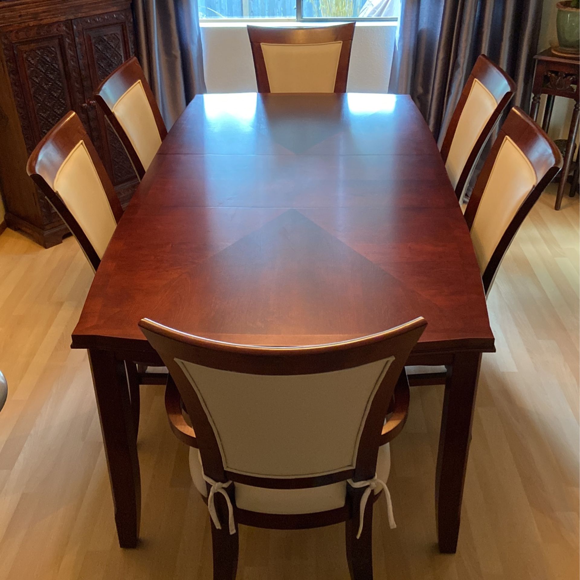 Dining room table made by Casana Furniture company