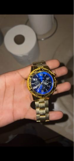 Blue and fake gold watch