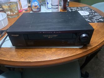 Sharp vhs player. Turns on but doesn't play.