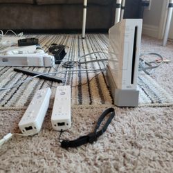 NINTENDO Wii For Sale. Selling As A Whole Attachmentments Chargers Games Yoga Mats And Wii Fit, 2 Controllers Me And My Son Don't Play It Anymore. 