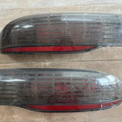 93-02 Pontiac Firebird Trans Am Grid Taillights Set OEM GM 1(contact info removed) 1(contact info removed) 
