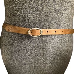 Tan belt with decorative cut outs