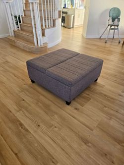 Gray storage ottoman