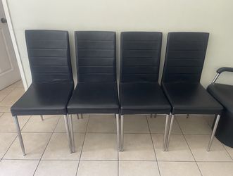 4 black vinyl faux leather dining chairs
