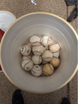 35 Baseballs and hitting Tee