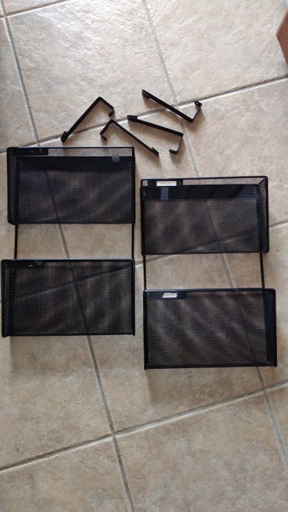 Two hanging office filing pockets