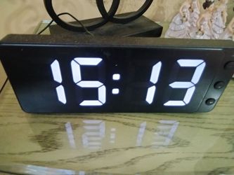 Reloj $15
