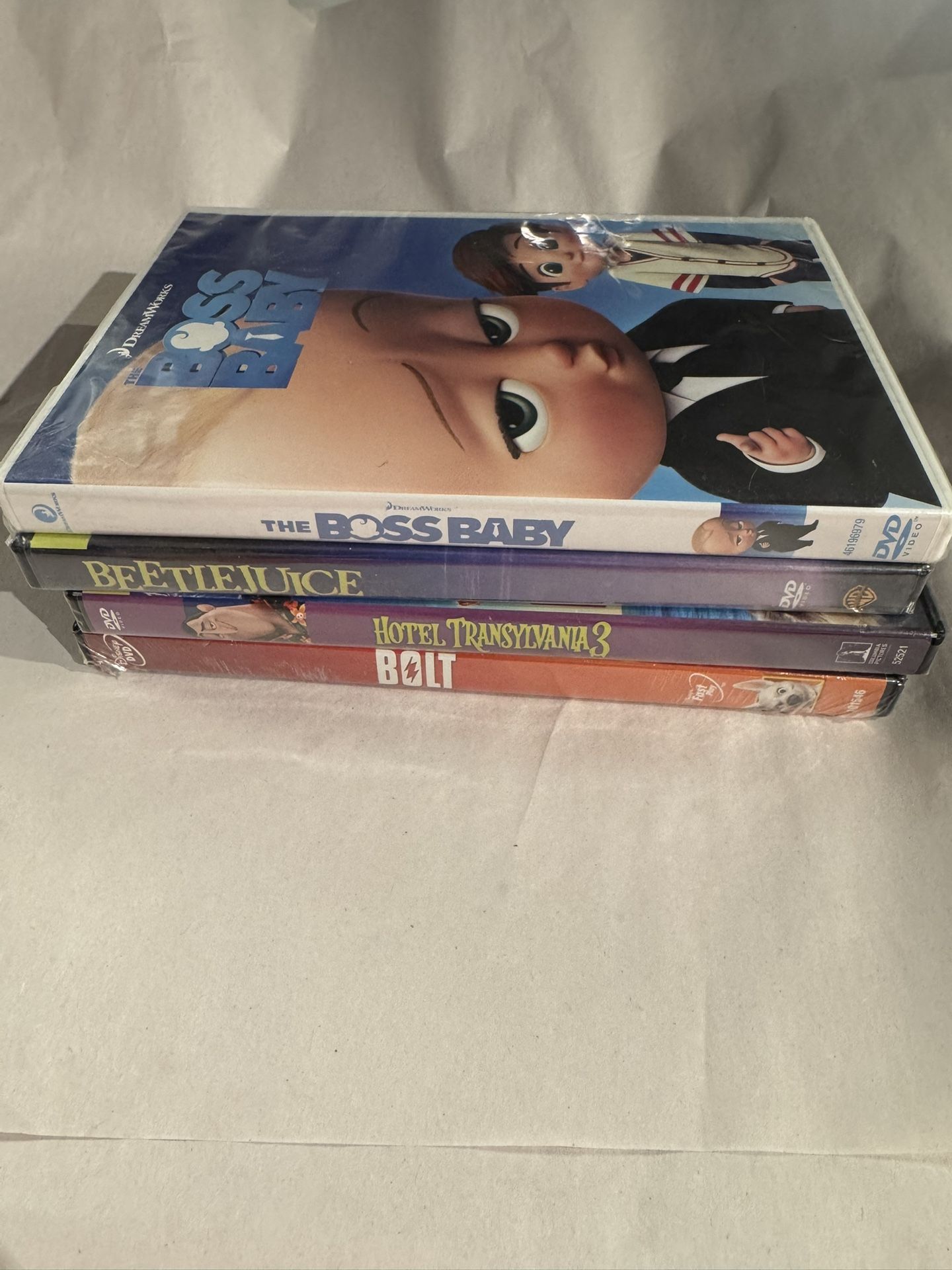 New mixed lot 4 DVD movies-Boss Baby,Bolt,Beetlejuice,hotel Transylvania 3