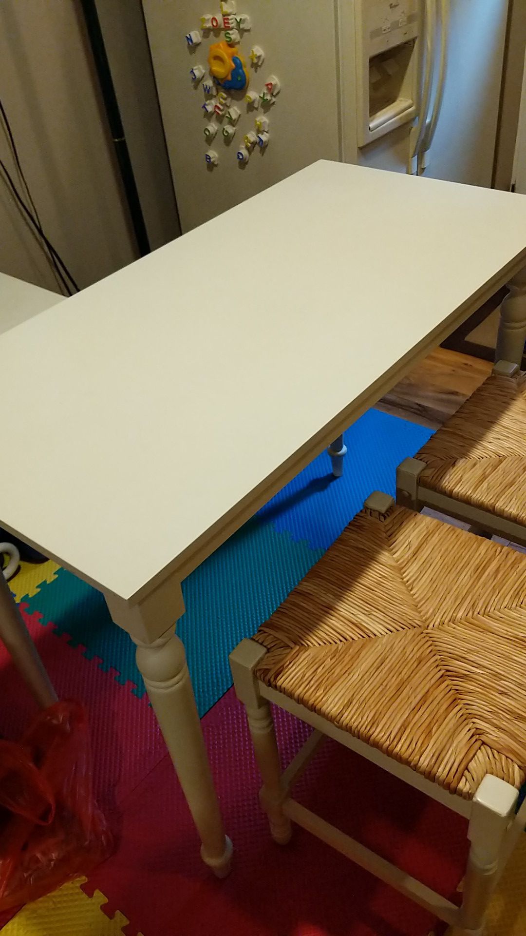 White bar table with two stools