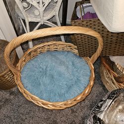 PET BEDS ASSORTED. SQUARE $10 EACH ROUND WICKER $34