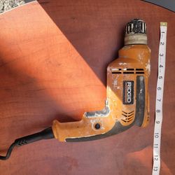 Ridgid Drill. Tool for construction and carpentry, functional electrical machine. Taladro