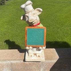 Pig Chef statue with chalkboard