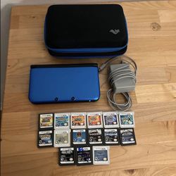 Blue Nintendo 3DS XL with case and games