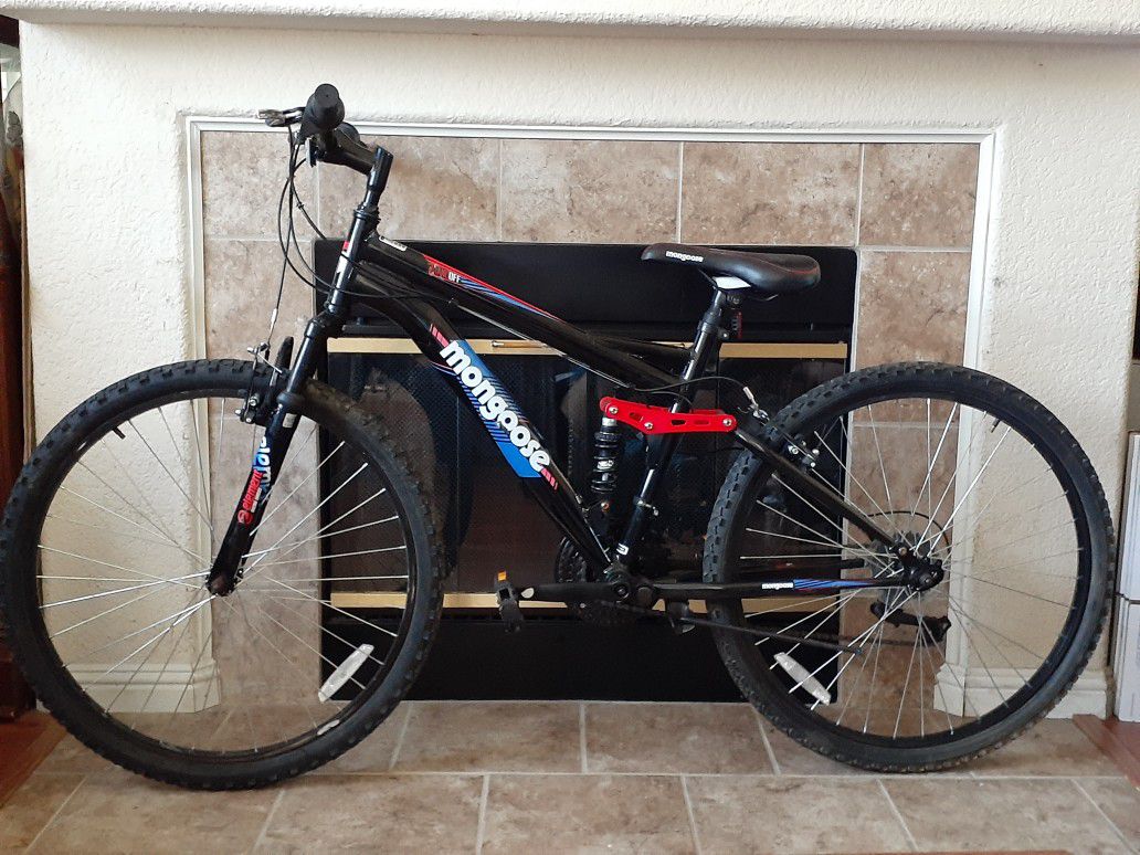 Mongoose Men's Standoff 26" Mountain Bike - Black/Red. I won't respond any low offer and still available.