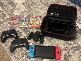 Nintendo switch PACKAGE with games and controllers