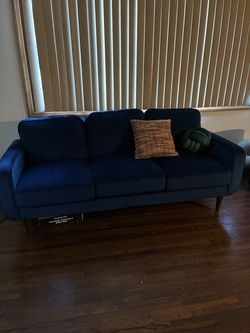 Blue love seat, retro chair and ottoman