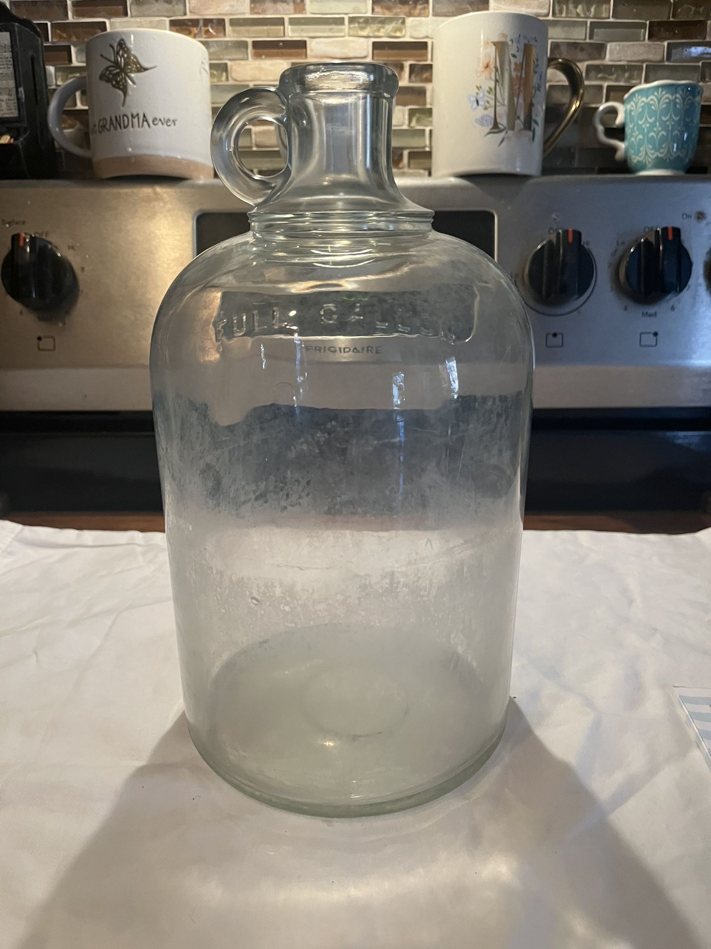 Vintage Gallon jug that says full gallon