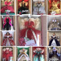 Two Sets Of Holiday Barbies