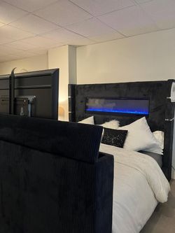 wingback TV bed in black corduroy features 16 color settings with crystal accent display