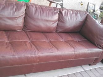 LEATHER COUCHES /SLIGHTLY USED/SLIGHT CAT SCRATCHES ON SIDE/ GREAT CONDITION COMFORTABLE