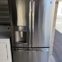 GE Stainless Steel Refrigerator And Freezer