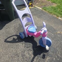 Tricycle with push handle