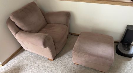 Free chair with footrest and free loveseat.
