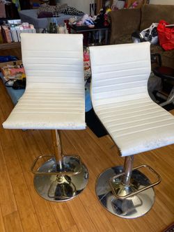 Two barber chairs for $30 both adjustable chairs
