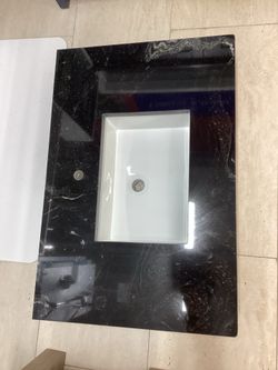 36” x 24” counter top in granite stone new with Undermount sink attached beautiful patterned single or3 hole for faucet ready for pick up today