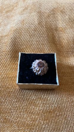 Woman’s sunflower ring with a stone